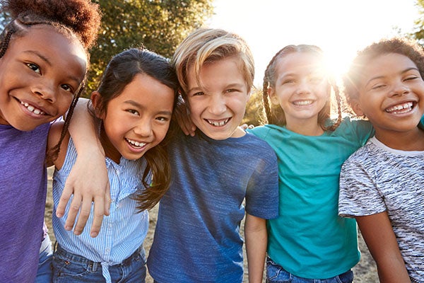 Smiling kids in a line