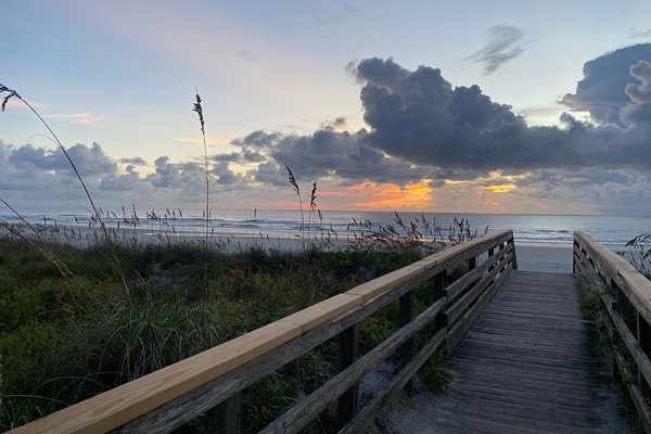 beach dune walkover and beautiful sunrise