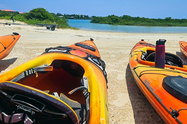 kayaks preparing for launch