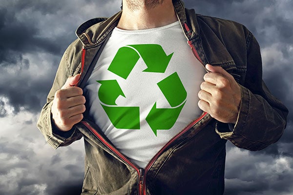 man with recycle t-shirt worn like superman reveal