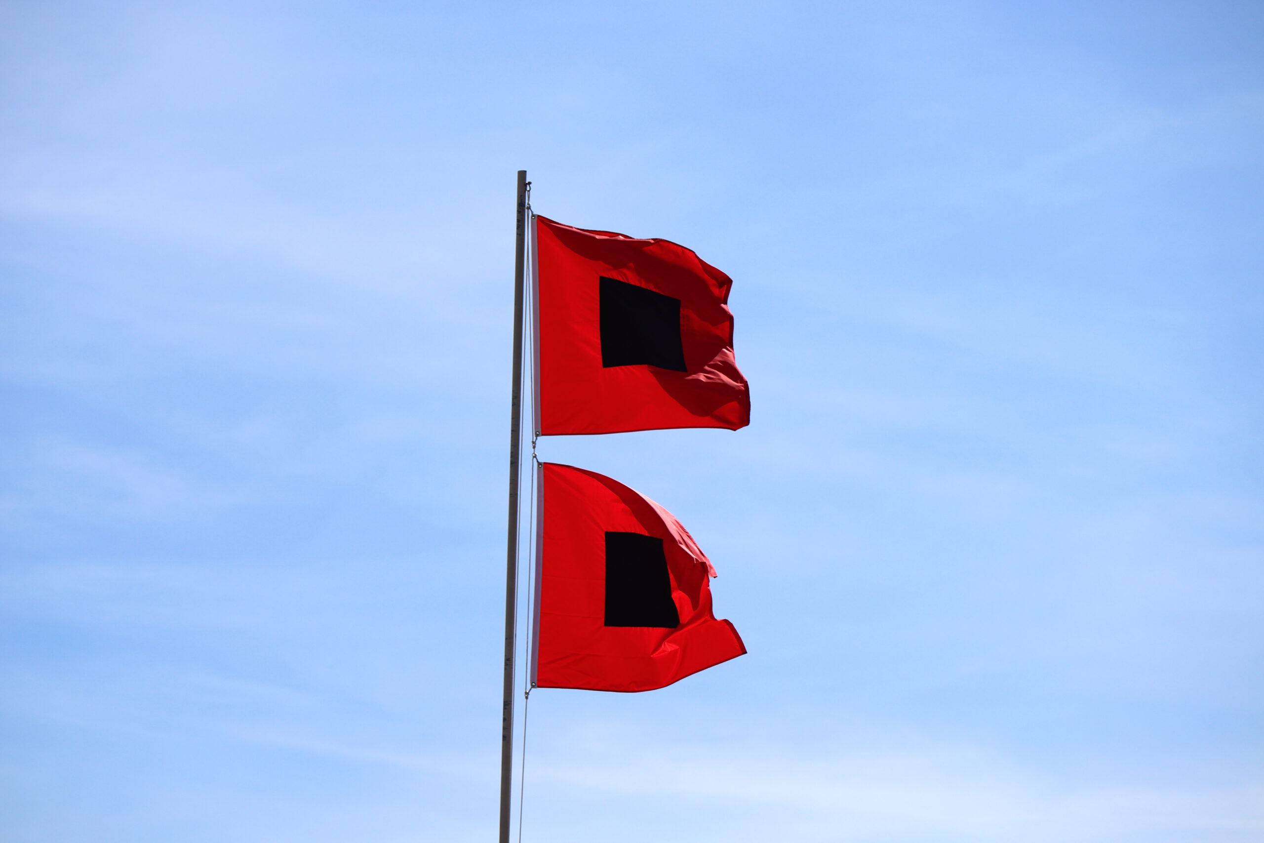 hurricane warning flags flying