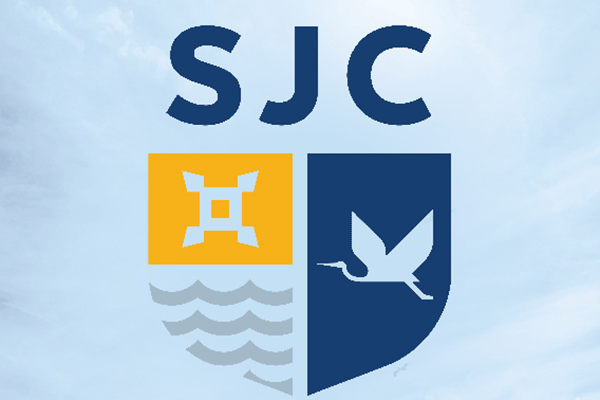 St. Johns County logo showing outline of fort, water, and bird