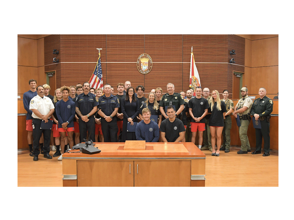 Sarah Arnold, Chair, and representatives from U.S. Customs and Border Protection, U.S. Coast Guard Northeast, National Park Service, Florida Fish and Wildlife, St. Johns County Sheriff’s Office St. Johns County Fire Rescue, St. Johns County Marine Rescue, and St. Augustine Beach Police Department recognize Water Safety Month