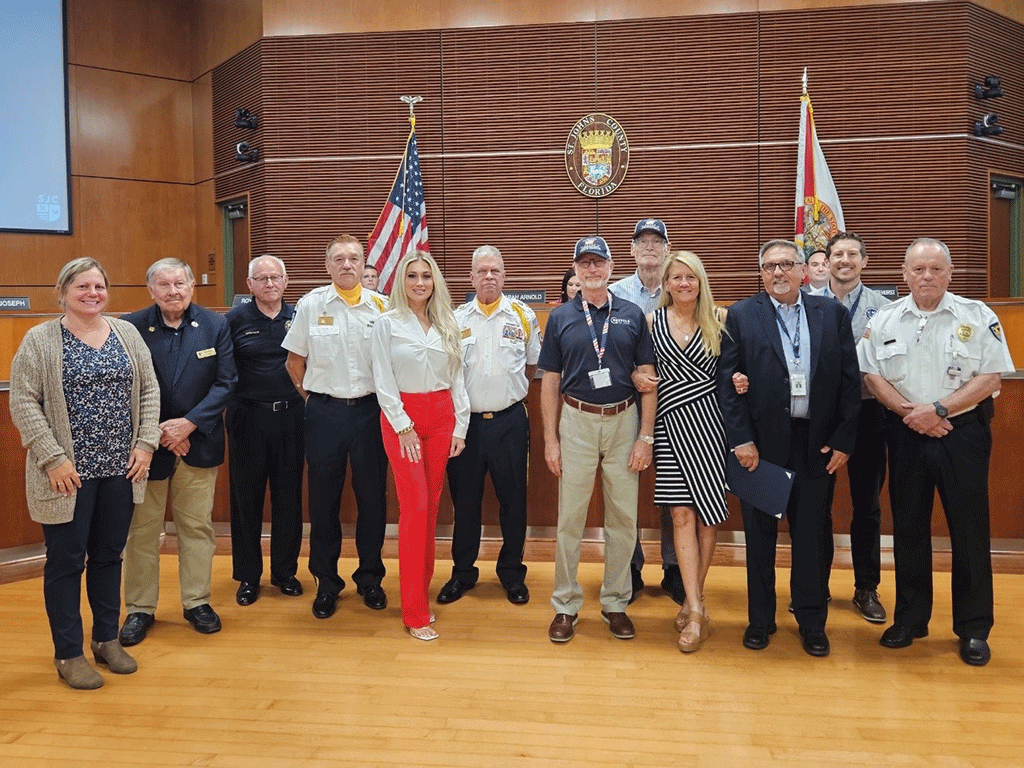 St. Johns County Board of County Commissioners recognizing American Flag Rescue Program with Jennifer Ravan, Assistant Tax Collector; Bill Dudley; Mac McDermott, Director of Veteran Services; Dan Weir, US Navy, VFW Post 91 Honor Guard; Ashley Mickler, Supervisor of Solid Waste Supervisor; Dan Hartman, US Army, VFW Post 91 Honor Guard; Waine Banyas, US Marine Corps; Chris Benjamin, founder of American Flag Rescue Program; Commissioner Krista Joseph; John Benton, Solid Waste Manager; Matt Denny, Recycling Coordinator; Clive Guest, British Royal Marines