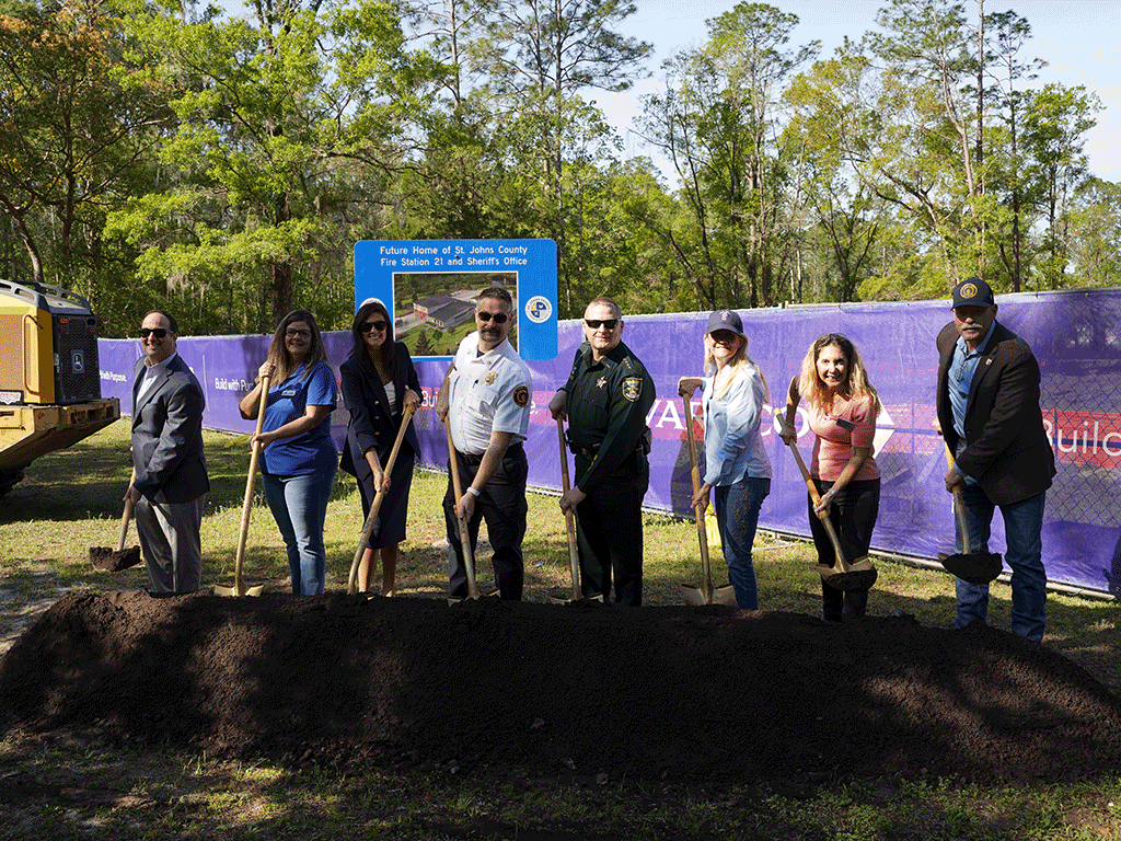 County Commissioners and officials participate in a ceremonial groundbreaking on the site of the new Fire Station 21 in Flagler Estates.