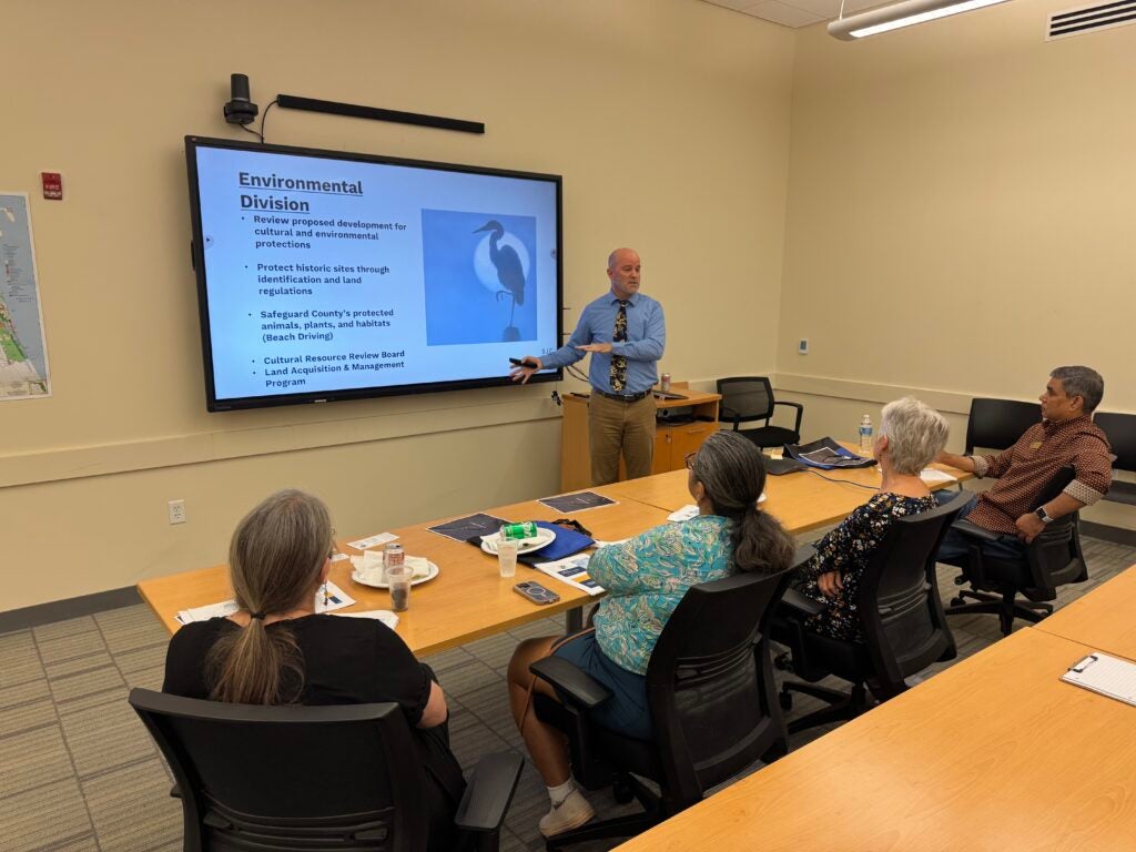 Growth Management director gives a presentation at SJC101 Citizen's Academy on the Environmental Division, supporting the Community Trust pillar of the Strategic Plan.