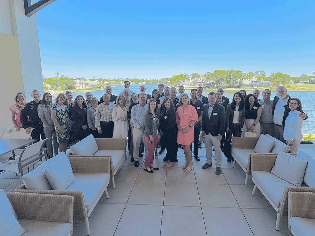 St. Johns County Staff and Commissioners pose with the Community Associations of Palm Valley and Ponte Vedra outside.