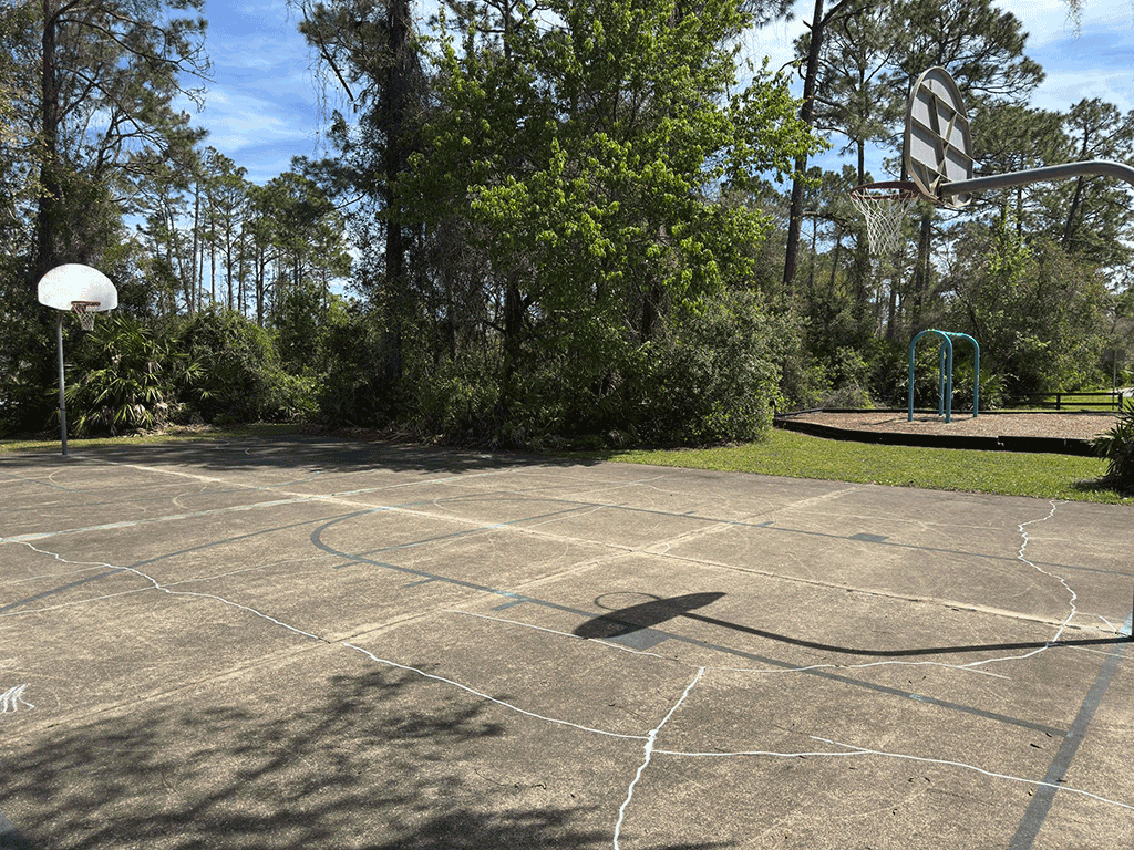 An outdoor basketball court.