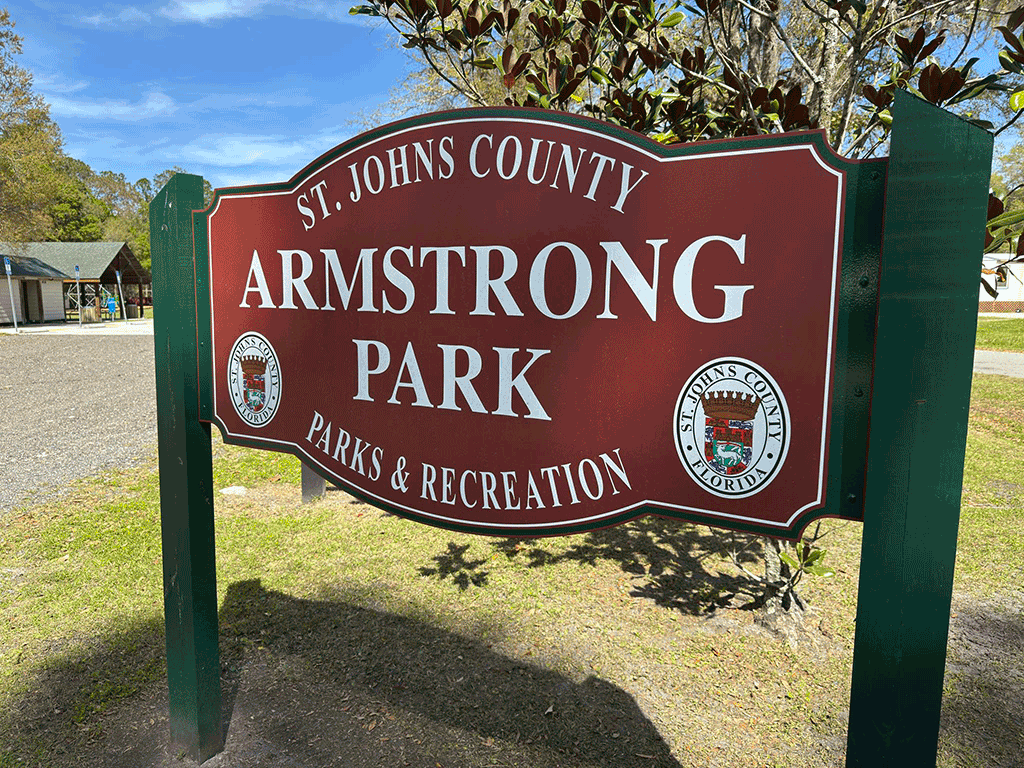 A sign for Armstrong Park.