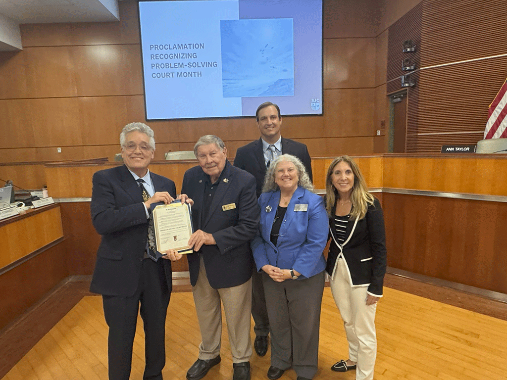Commissioner Taylor presents the proclamation recognizing problem-solving court month.