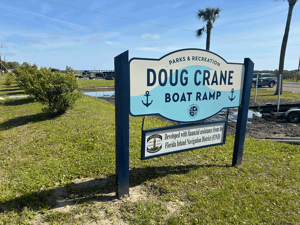 A sign for the Doug Crane Boat Ramp.