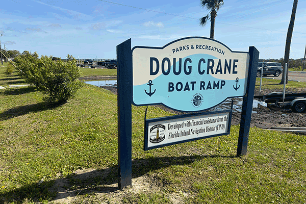 A sign for the Doug Crane Boat Ramp.