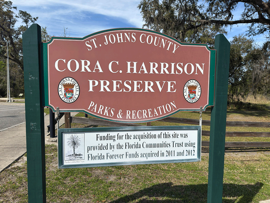 A sign for Cora Harrison Preserve