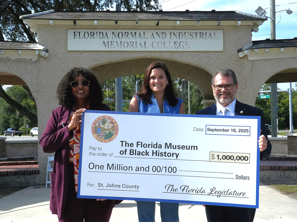 State Rep. Kiyan Michael, District 16; Sarah Arnold, District 2 Commissioner for St. Johns County; State Sen. Thomas J. Leek, District 7 holding a check for $1 million