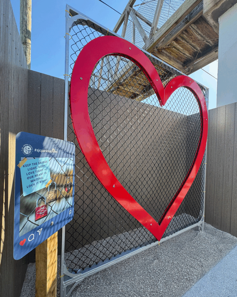 Heart cutout outlining a fence panel intended for locks of love