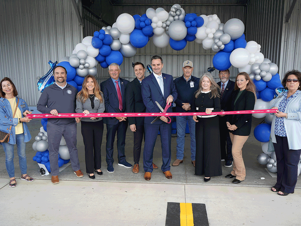 Commissioners Taylor, Whitehurst, and Murphy cut the ribbon with City of St Augustine mayor Nancy Cline and others