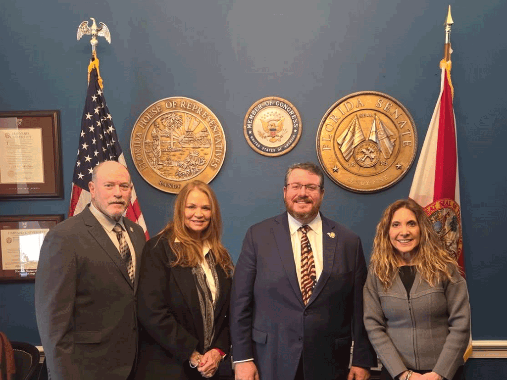 BCC Vice-Chair Taylor and Chair Murphy smile with Representative Randy Fine
