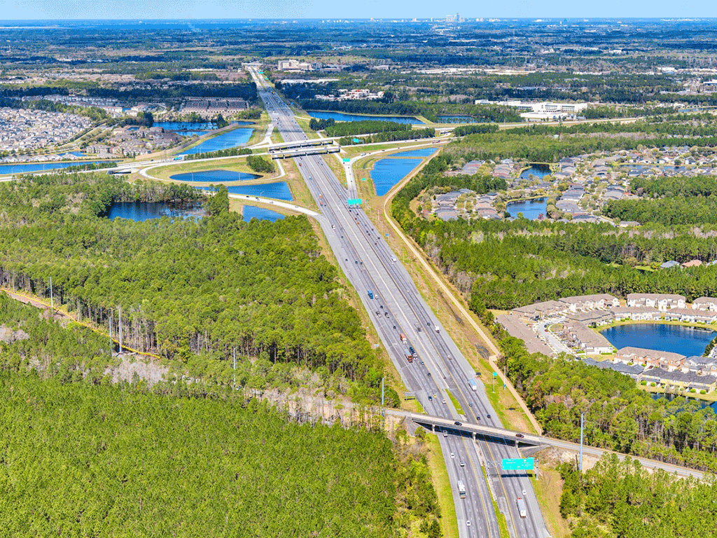Aerial of a highway with cars on it
