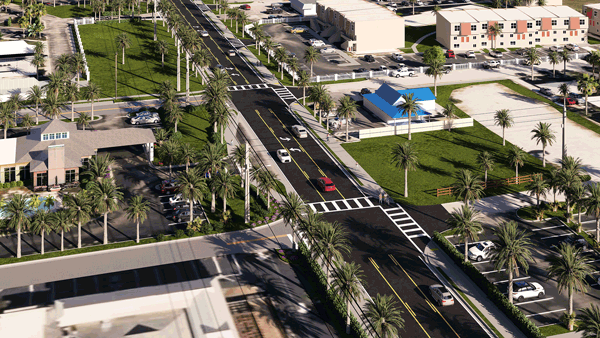 2 - Rendition looking northeast at a slightly different angle than image 1 of the proposed 10-foot wide concrete SUN Trail at Beach Boulevard between Pope Road and A1A showing crosswalks and moving traffic.