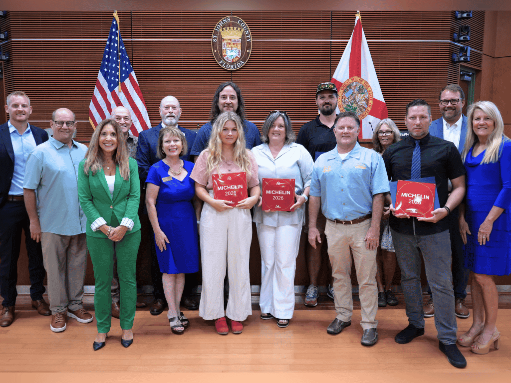 Commissioners Arnold, Joseph, and Chair Murphy with restaurant owners